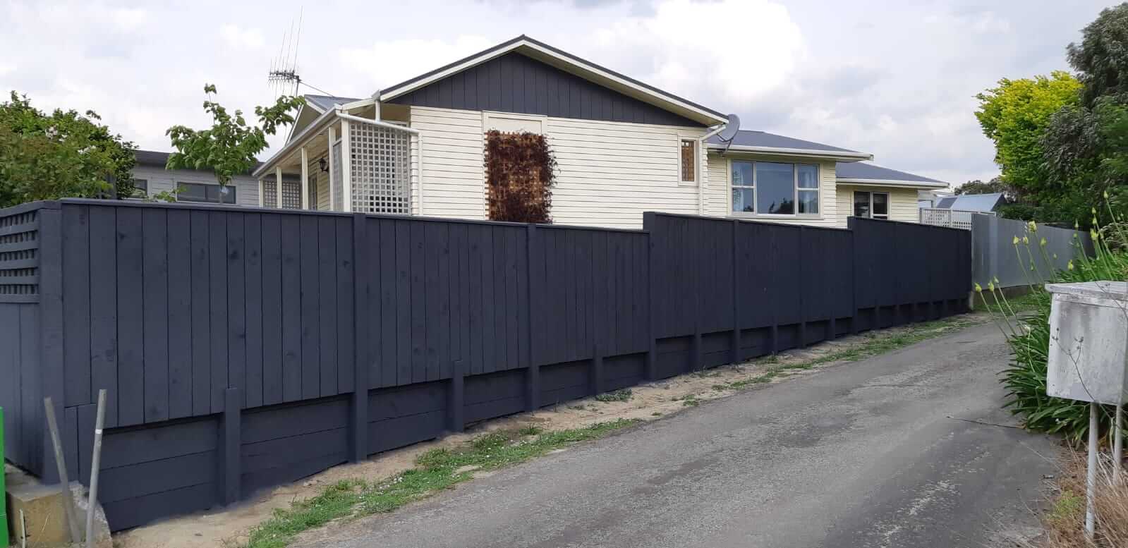 After picture fence retaining wall 1